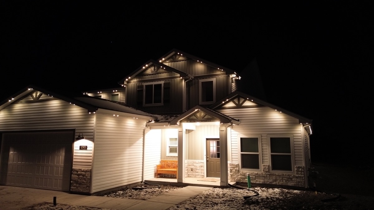 Salt Lake City modern farmhouse with permanent motion sensor LED lighting across the roofline
